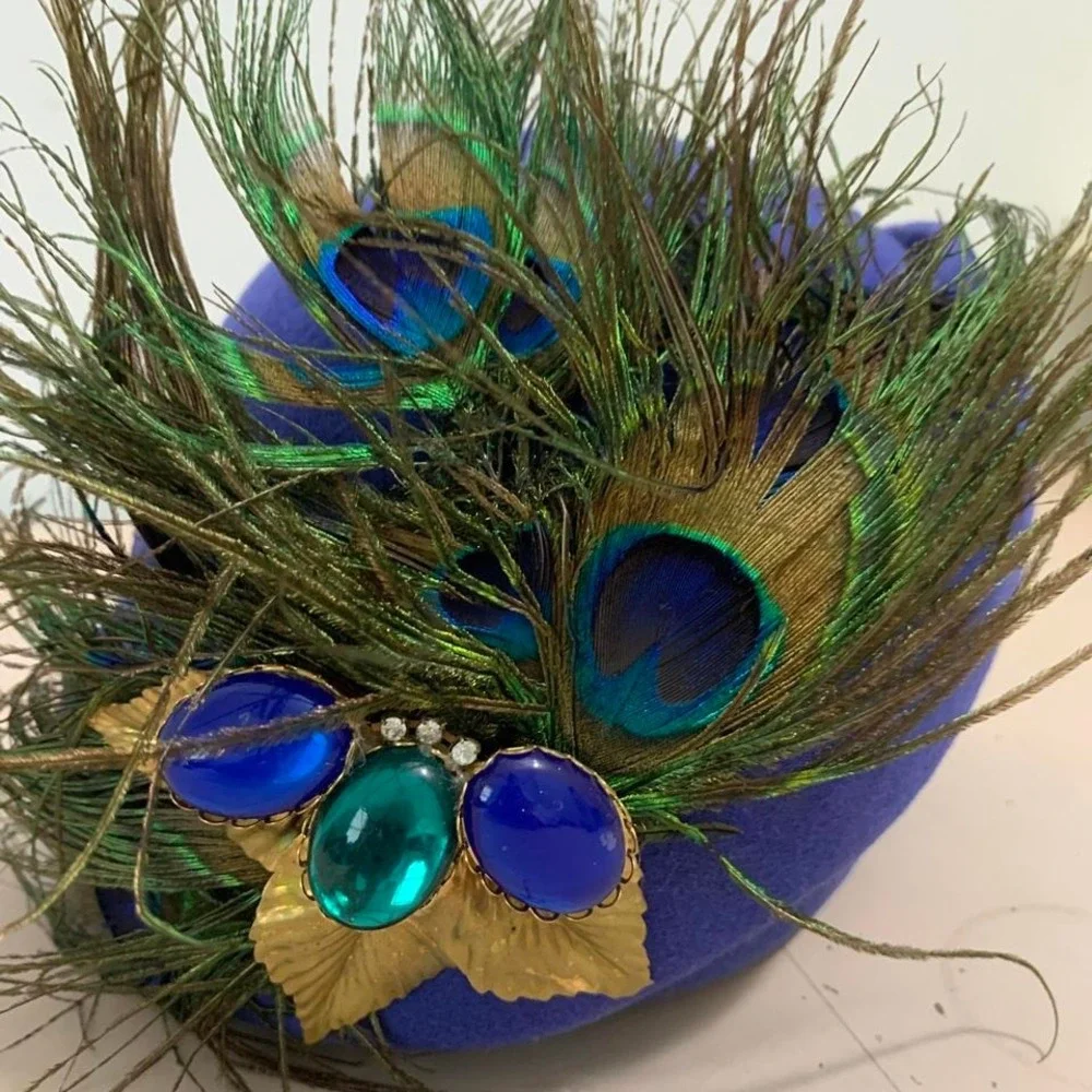 Vintage 1950s blue peacock feather mask with green‎ and blue accents